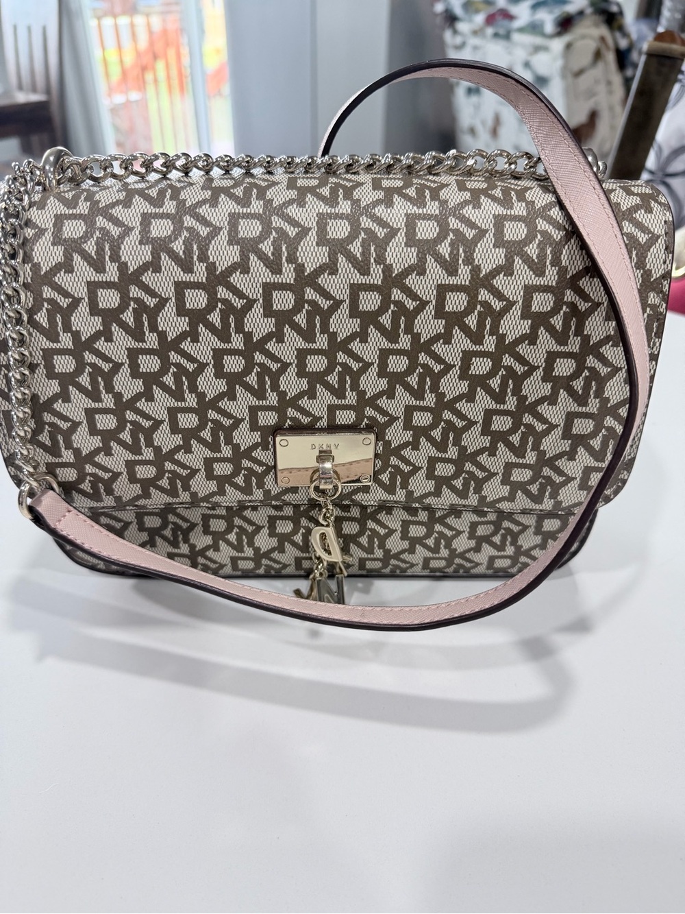 DKNY Cleo Medium Shoulder Bag featuring a signature monogram logo jacquard.